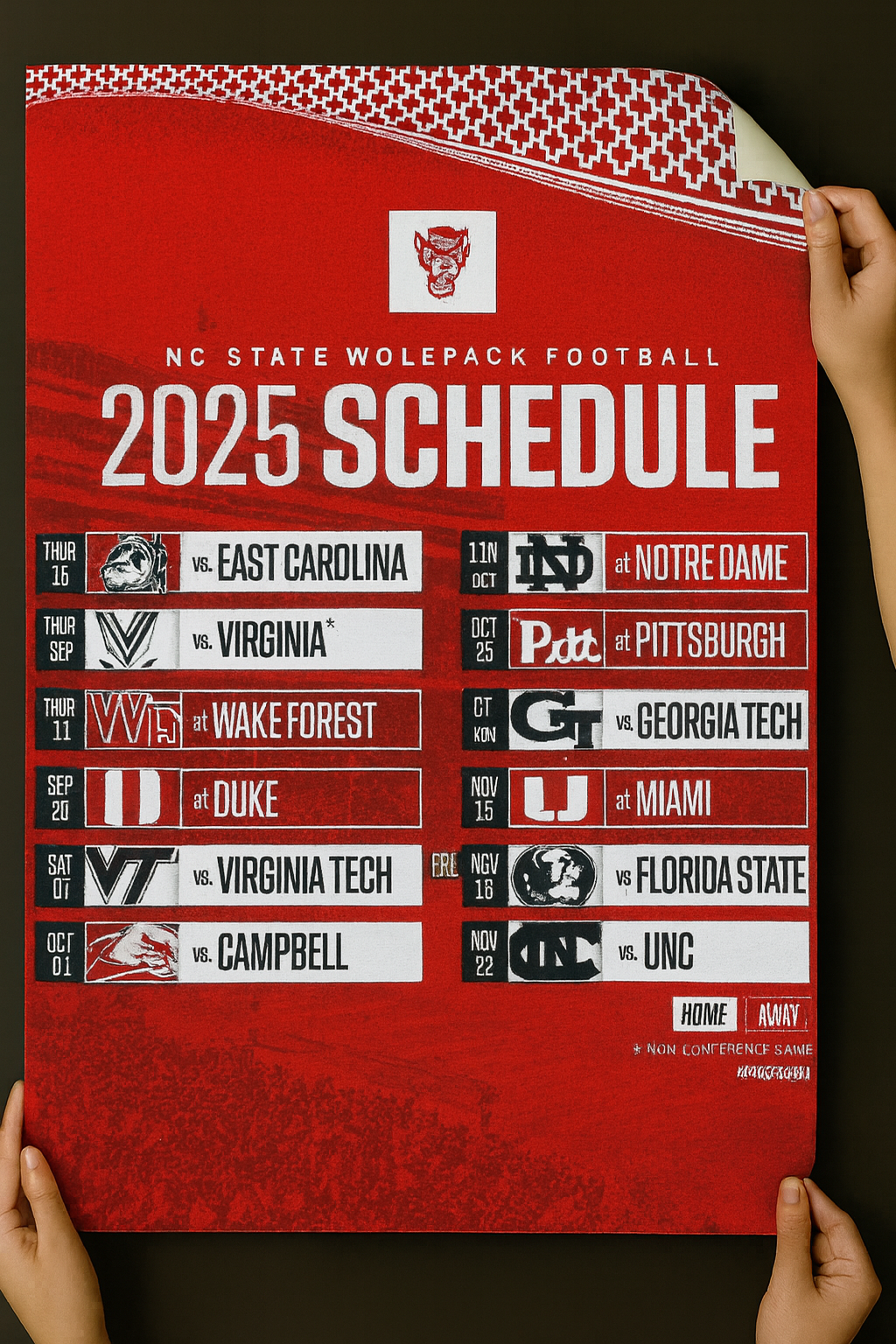 NC State Wolfpack football 2025 schedule poster held by two hands on a dark background